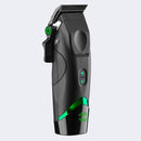 Hair clipper with green accents on a light gray background