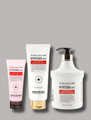 Three Histemo hair and scalp care products on a solid gray background: a light pink squeeze tube, a white squeeze tube with a gold base, and a large white pump bottle with a black and gold pump.